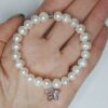 Жіночий браслет з перлин та кулону Квітка